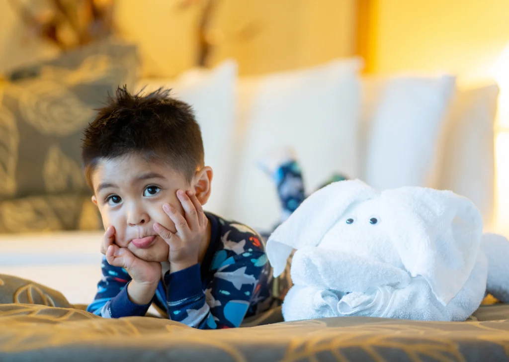 a kid in a hotel room