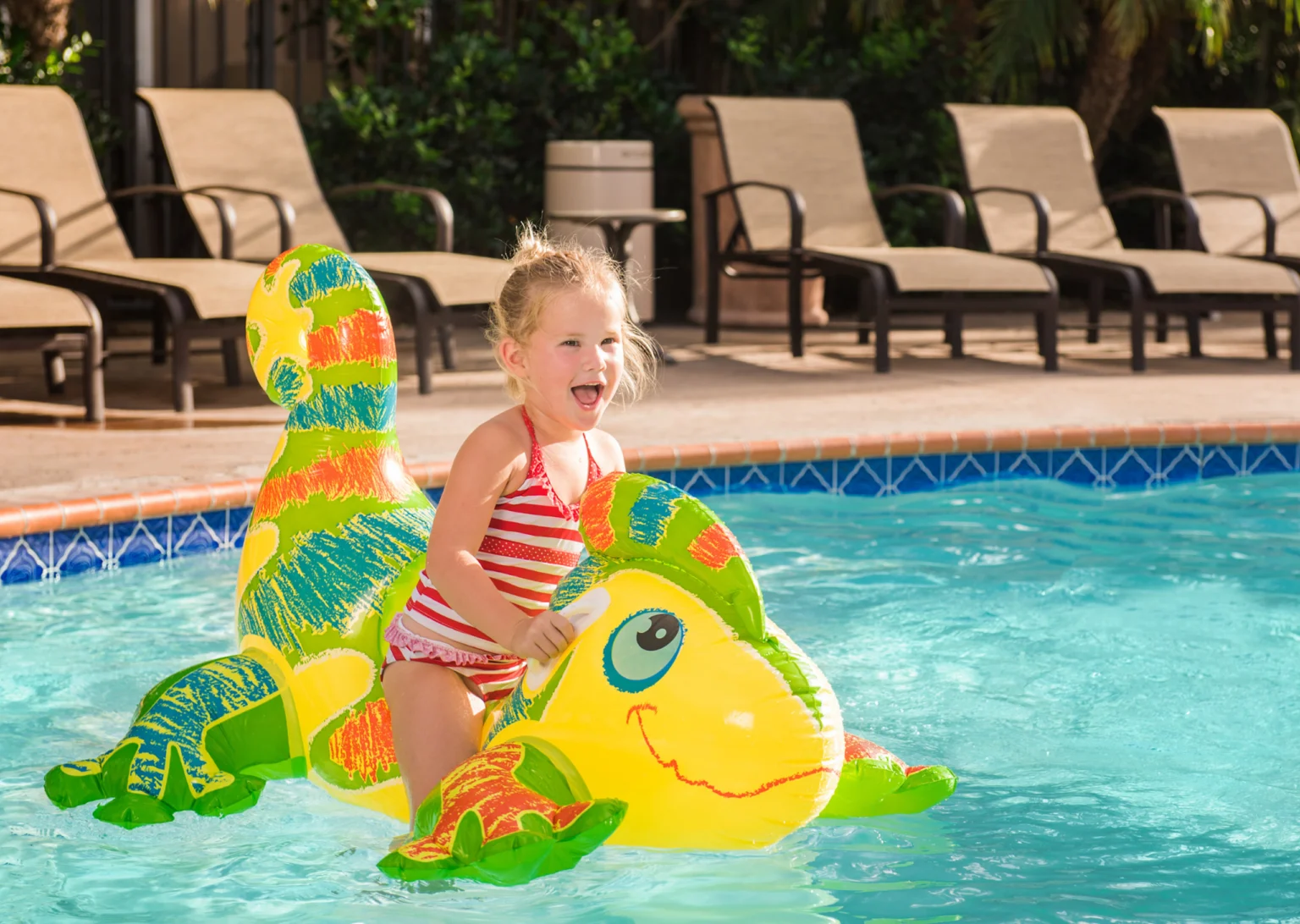 Kid playing in the TropicalPool