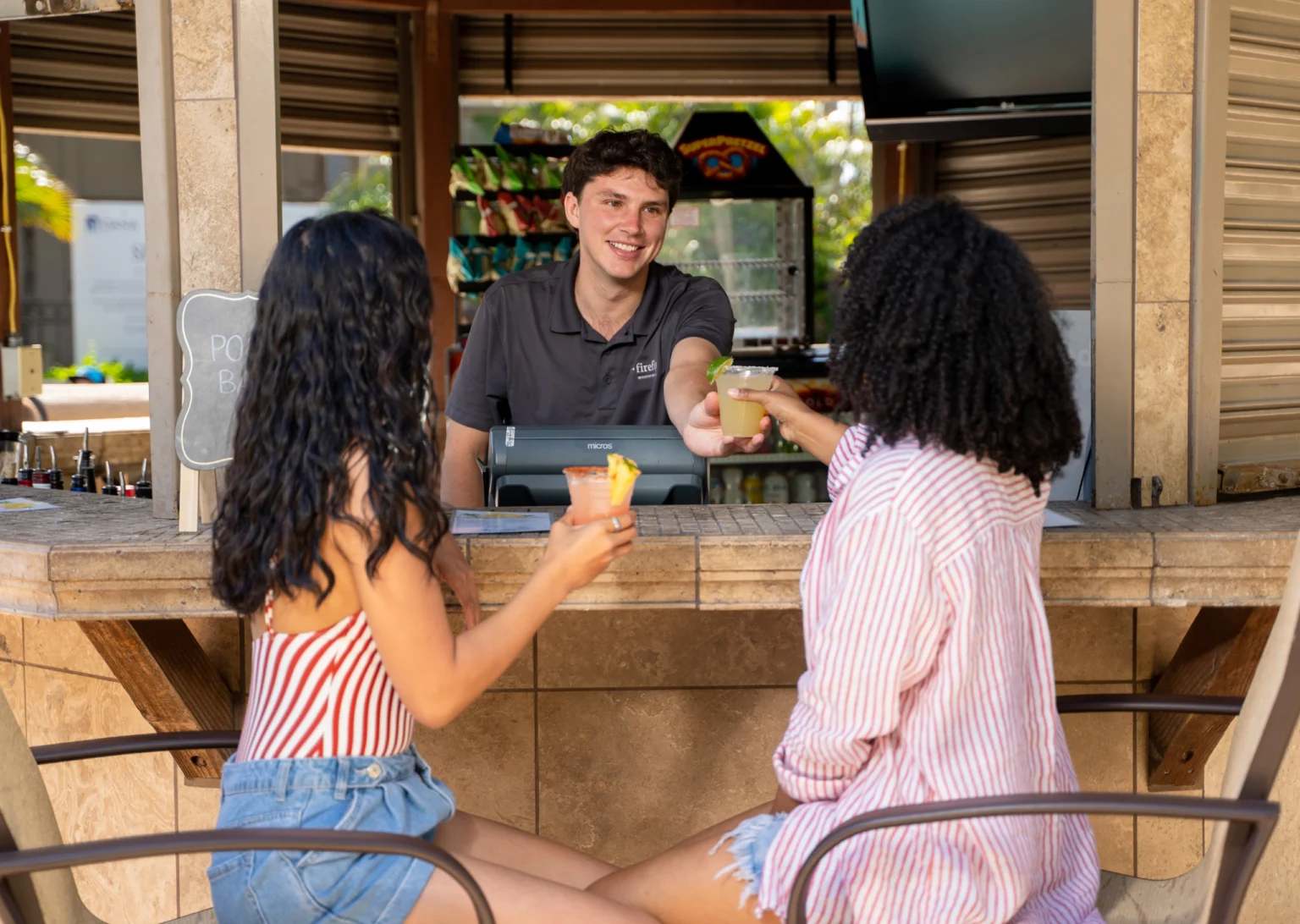 guests at the pool bar