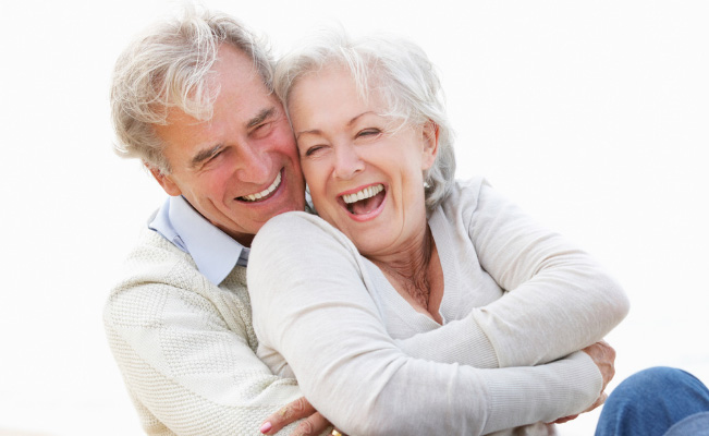 a senior couple laughing