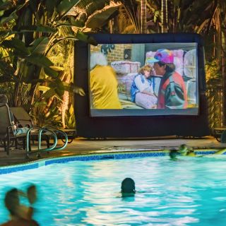 Pool-side screen showing a movie