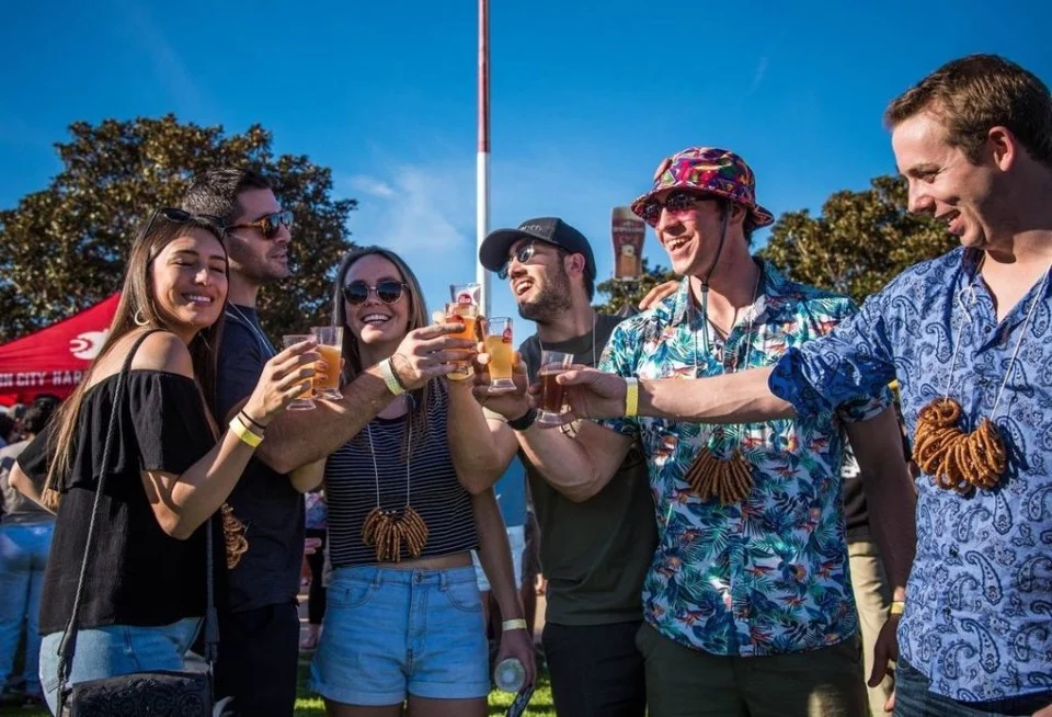 Friends toasting at Brew Fest