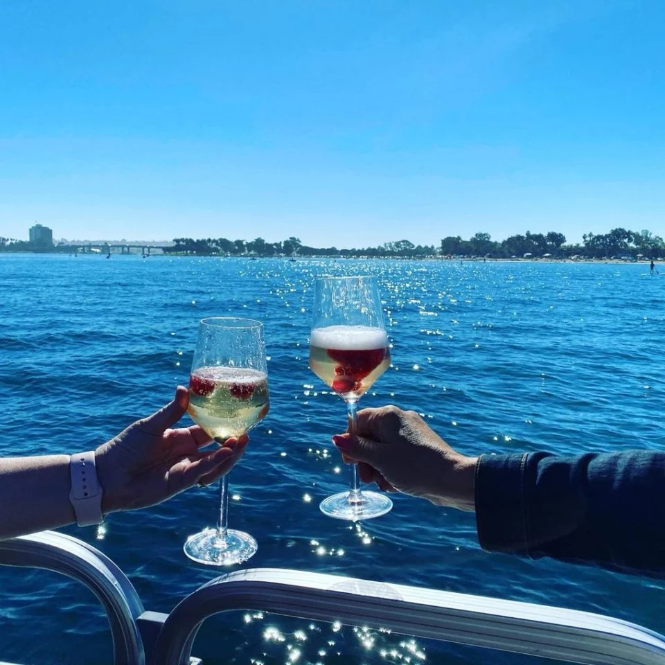 champagne toast on a boat