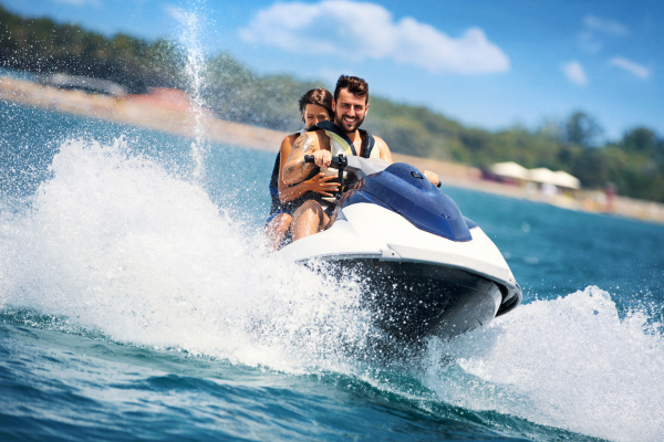Two people on a jet ski