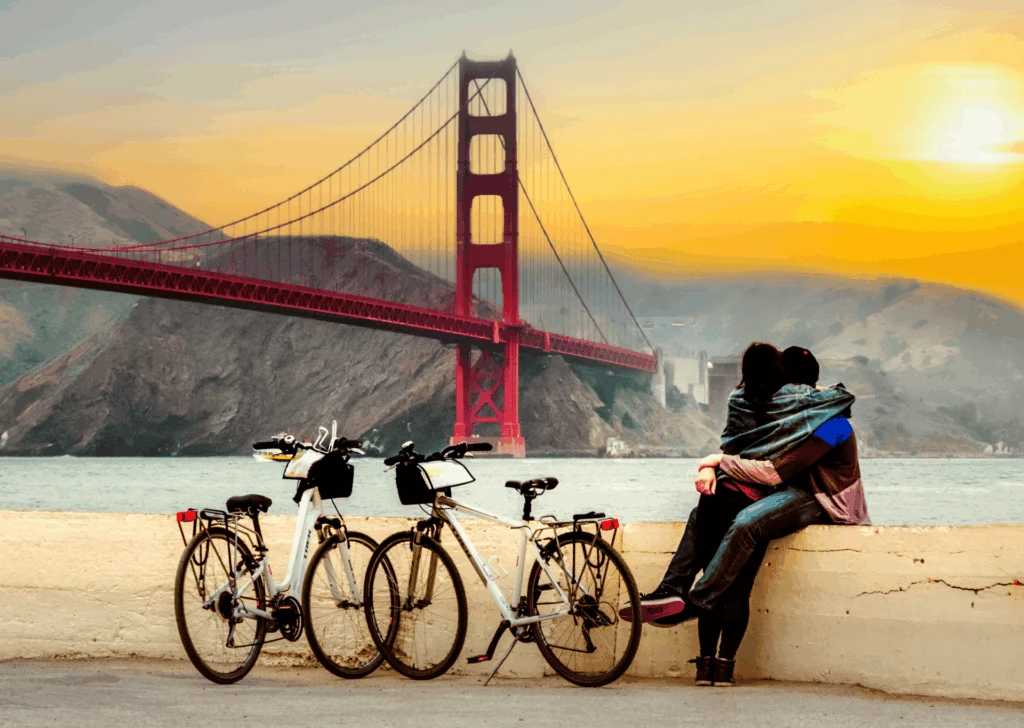 couple in front of golden gate bridge
