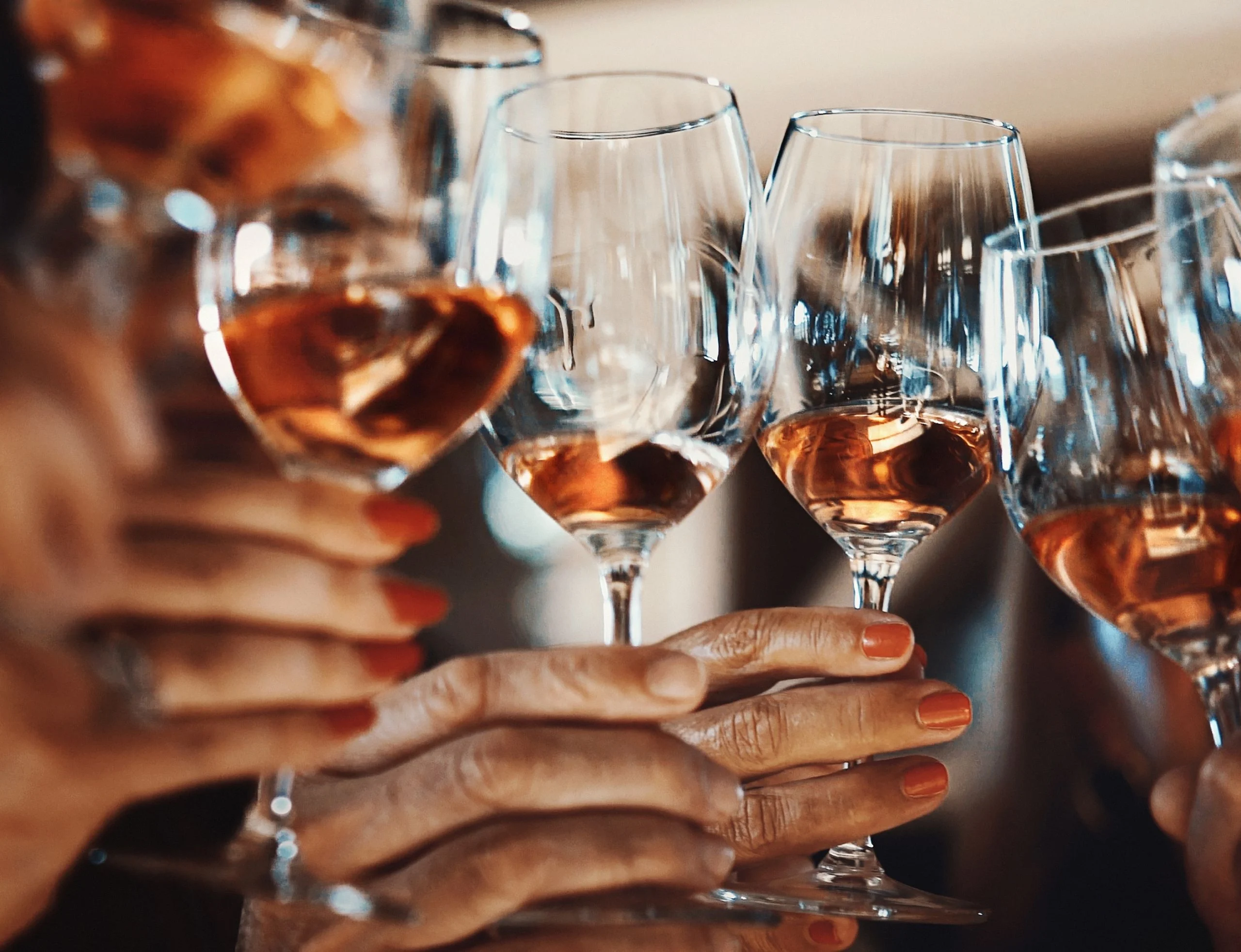 wine glasses cheersing