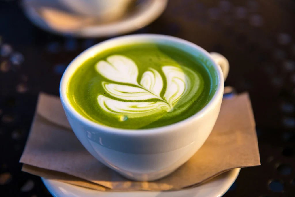 a matcha latte with art