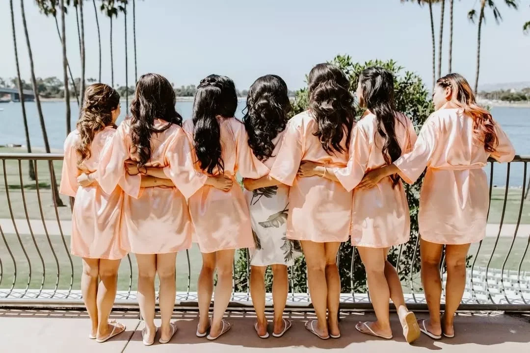 girls standing on balcony overlooking mission bay