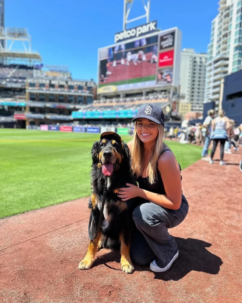 dog and lady in front of petco park
