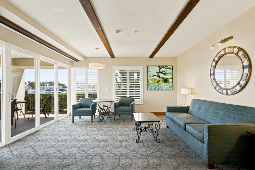 living room and balcony in Bayside Conference Queen Suite at The Dana on Mission Bay San Diego