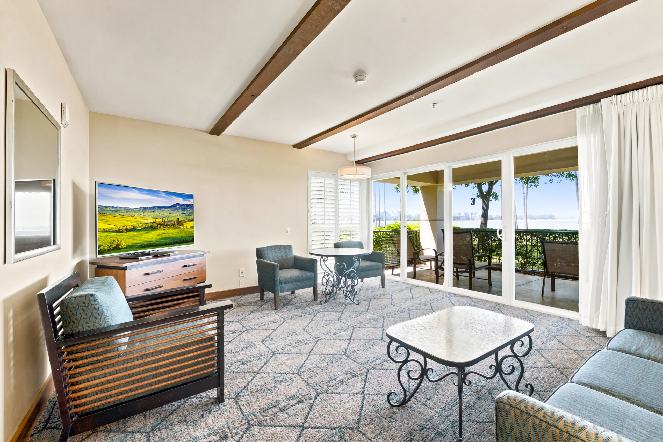 living room and balcony bay view in Bay View Accessible Suite at The Dana on Mission Bay San Diego